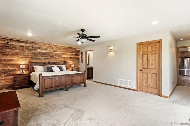 116 County Road 414, Granby, CO 80446 - bedroom with stainless steel fridge, carpet floors, wood walls, recessed lighting, and a ceiling fan
