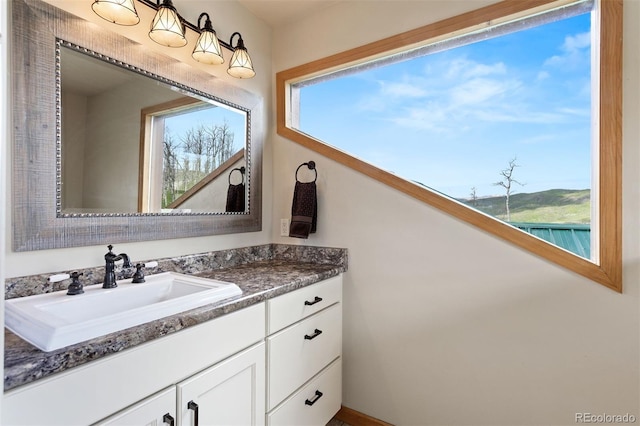 116 County Road 414, Granby, CO 80446 - bathroom with vanity and healthy amount of natural light