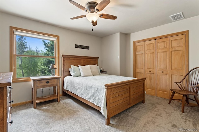 116 County Road 414, Granby, CO 80446 - bedroom with light carpet, a closet, and a ceiling fan