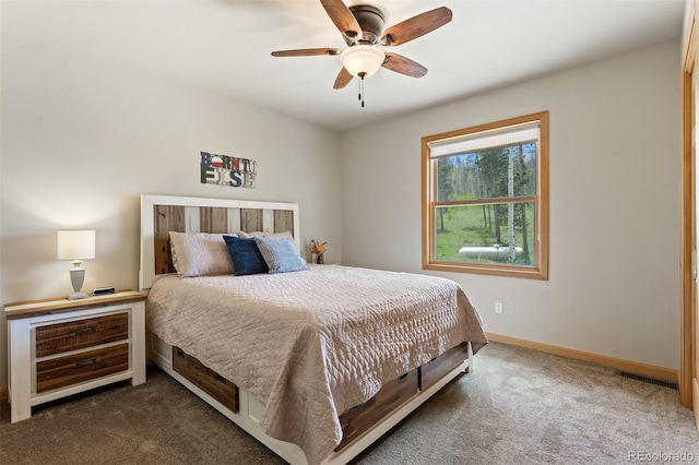 116 County Road 414, Granby, CO 80446 - carpeted bedroom featuring baseboards and a ceiling fan