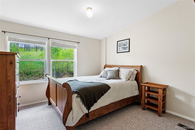 116 County Road 414, Granby, CO 80446 - carpeted bedroom featuring baseboards and lofted ceiling