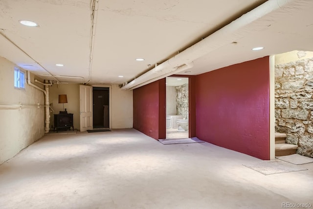 interior space featuring a wood stove