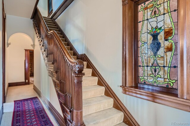 stairway with carpet floors