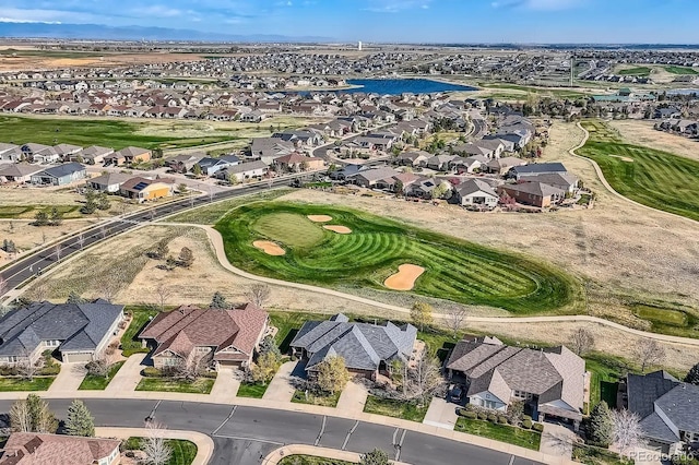 birds eye view of property featuring a residential view, a water view, and golf course view