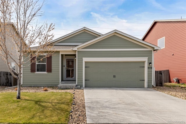 single story home featuring a garage, fence, concrete driveway, and a front lawn