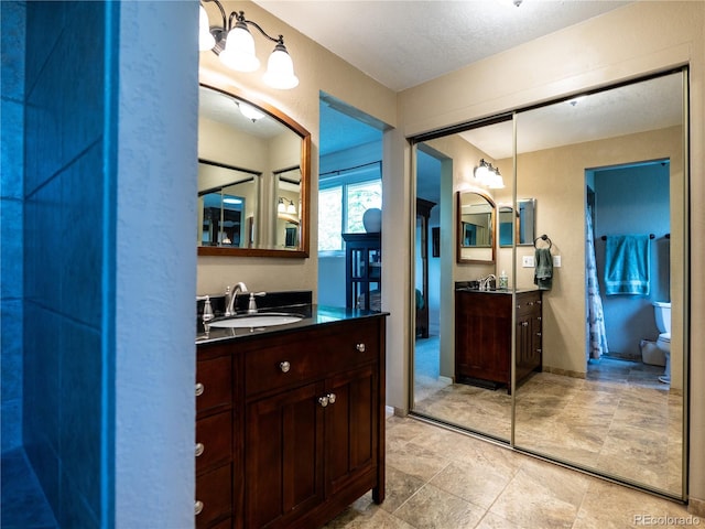 8908 Jellison Ct, Westminster, CO 80021 - bathroom with vanity and toilet