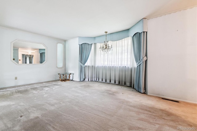 7129 S Marshall St, Littleton, CO 80128 - spare room with a chandelier and carpet