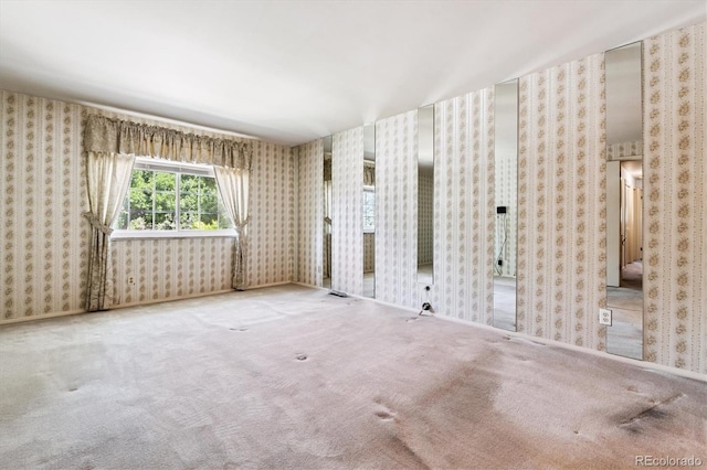 7129 S Marshall St, Littleton, CO 80128 - carpeted spare room with wallpapered walls