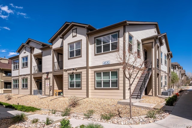 view of front of property with stairs