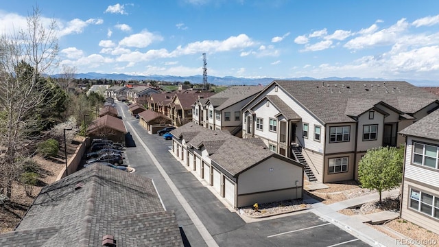bird's eye view featuring a mountain view and a residential view