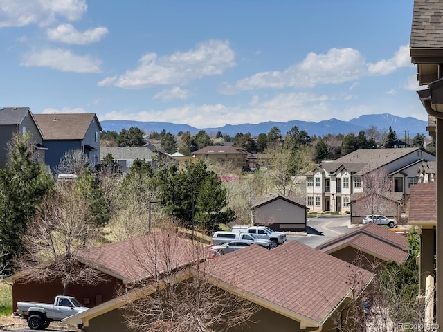 property view of mountains featuring a residential view