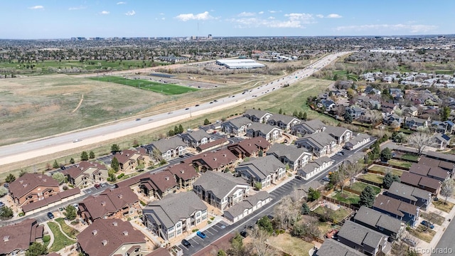 birds eye view of property with a residential view