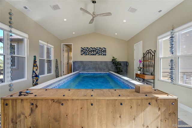 view of pool with a ceiling fan