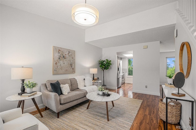 5210 Garrison St Unit 2, Arvada, CO 80002 - living area with wood finished floors and baseboards