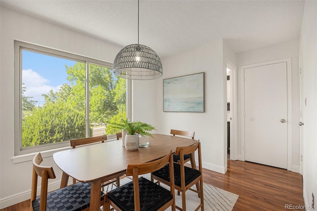 5210 Garrison St Unit 2, Arvada, CO 80002 - dining area with a textured ceiling and wood finished floors