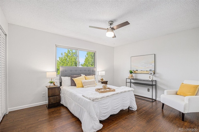 5210 Garrison St Unit 2, Arvada, CO 80002 - bedroom featuring dark wood-style flooring, a textured ceiling, and ceiling fan