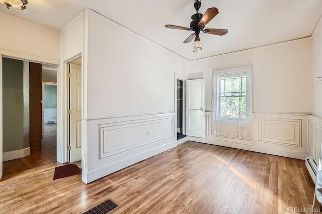 unfurnished bedroom featuring light hardwood / wood-style floors and ceiling fan