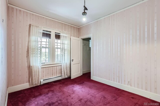 interior space featuring ornamental molding, carpet flooring, and a baseboard radiator