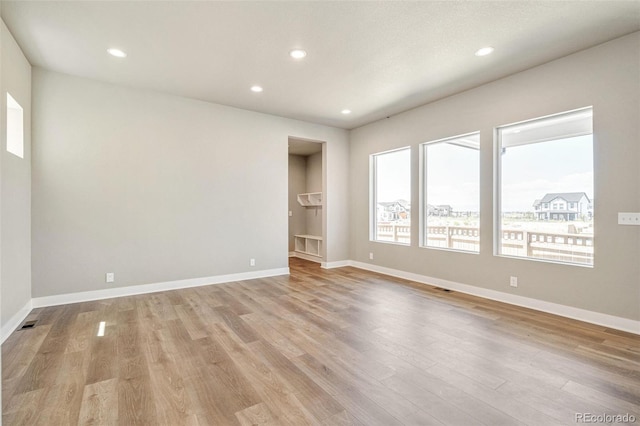 21022 E 63rd Dr, Aurora, CO 80019 - spare room featuring light hardwood / wood-style floors
