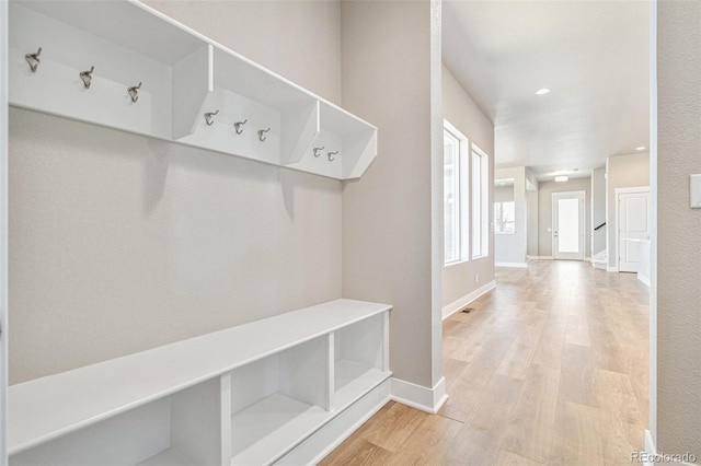 21022 E 63rd Dr, Aurora, CO 80019 - mudroom featuring light hardwood / wood-style floors