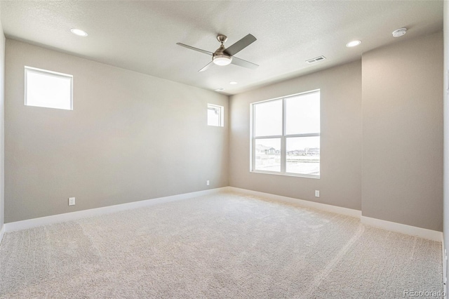 21022 E 63rd Dr, Aurora, CO 80019 - spare room with a textured ceiling, ceiling fan, and carpet flooring