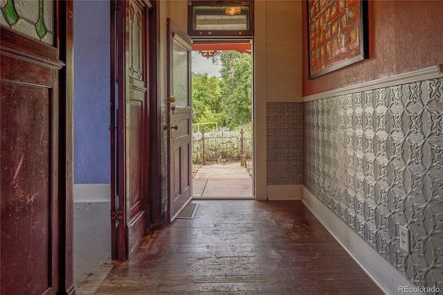 doorway to outside with dark hardwood / wood-style flooring