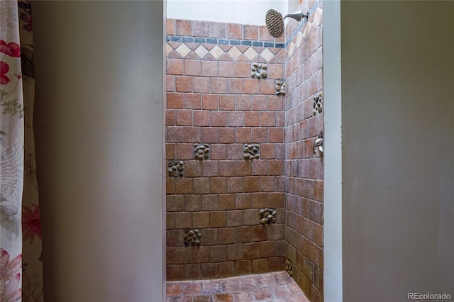 bathroom featuring a shower with curtain