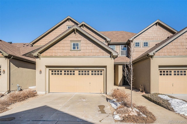 craftsman inspired home with a garage