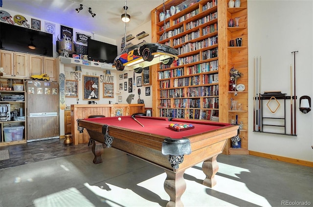 rec room featuring pool table and concrete flooring