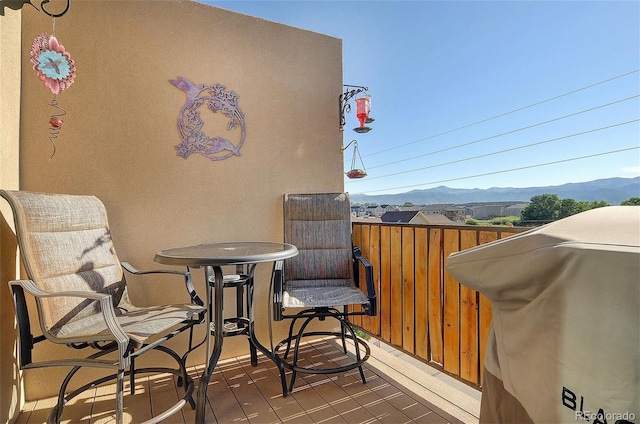 balcony featuring a mountain view