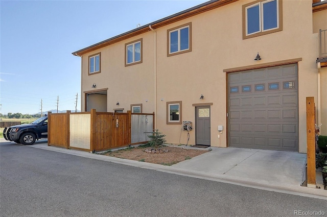 view of front of property featuring a garage