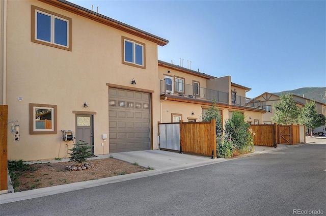 123 Halleys Ave Unit C, Poncha Springs, CO 81242 - multi unit property with an attached garage, stucco siding, and concrete driveway