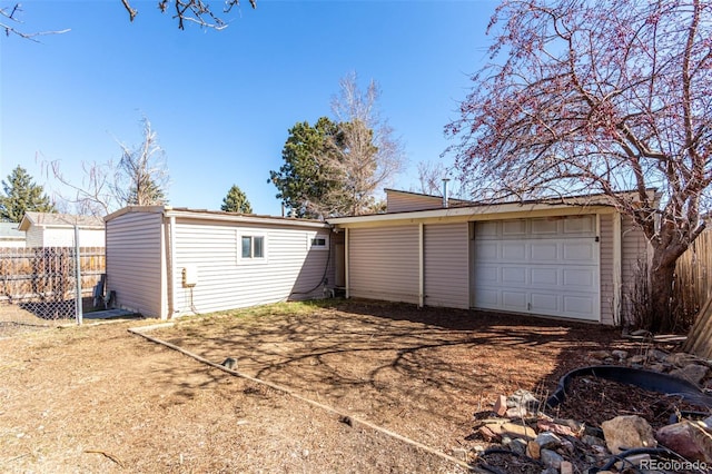 garage featuring fence