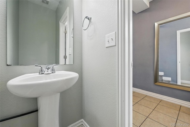 18619 E 50th Pl, Denver, CO 80249 - bathroom with tile patterned floors and baseboards