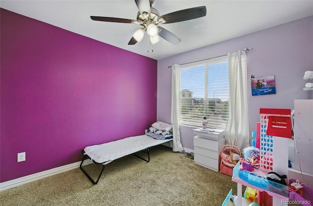 18619 E 50th Pl, Denver, CO 80249 - carpeted bedroom featuring baseboards and ceiling fan