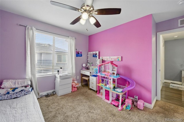 18619 E 50th Pl, Denver, CO 80249 - carpeted bedroom featuring baseboards and ceiling fan