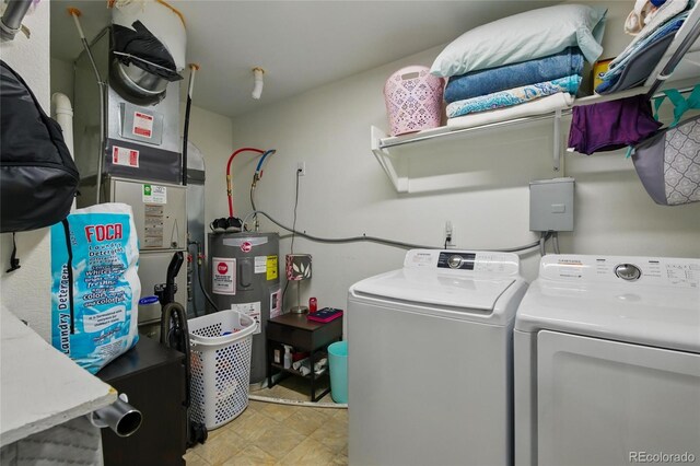 18619 E 50th Pl, Denver, CO 80249 - washroom with separate washer and dryer and electric water heater