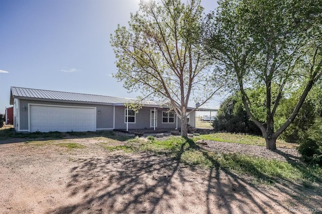 39045 Big Springs Rd, Rush, CO 80833 - ranch-style home with a garage and metal roof