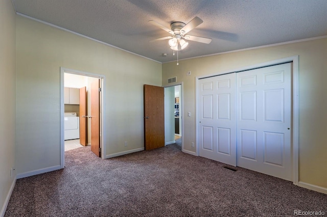 39045 Big Springs Rd, Rush, CO 80833 - unfurnished bedroom featuring washer / dryer, crown molding, carpet flooring, a textured ceiling, and baseboards