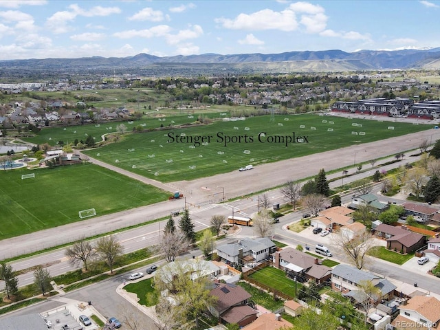 11165 W 58th Ave, Arvada, CO 80002 - aerial perspective of suburban area featuring a mountainous background