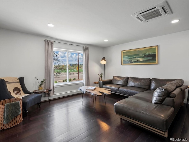 11165 W 58th Ave, Arvada, CO 80002 - living area featuring dark wood-type flooring, recessed lighting, and a baseboard heating unit