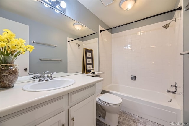 full bath with bathtub / shower combination, vanity, and toilet