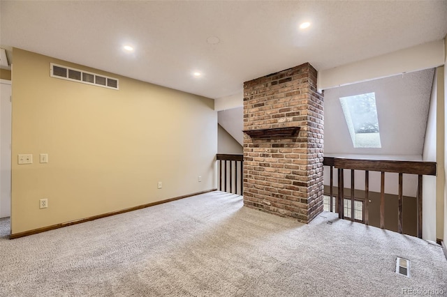 unfurnished living room featuring baseboards, visible vents, carpet flooring, and recessed lighting