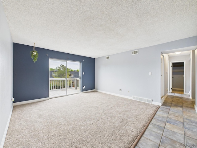 190 E Highline Cir Unit 302, Centennial, CO 80122 - carpeted empty room with a textured ceiling and baseboards