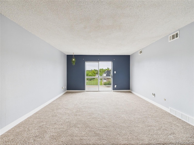190 E Highline Cir Unit 302, Centennial, CO 80122 - carpeted empty room featuring a textured ceiling and baseboards