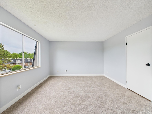 190 E Highline Cir Unit 302, Centennial, CO 80122 - carpeted empty room with a textured ceiling and baseboards