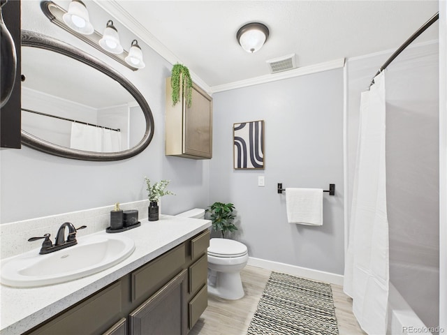 190 E Highline Cir Unit 302, Centennial, CO 80122 - full bath with vanity, toilet, wood finished floors, and ornamental molding