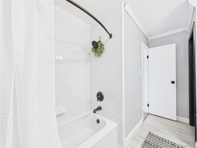 190 E Highline Cir Unit 302, Centennial, CO 80122 - bathroom with crown molding, shower / bath combo with shower curtain, wood finished floors, and baseboards