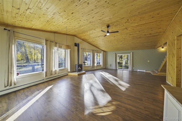 unfurnished living room featuring a wealth of natural light, wood ceiling, and dark hardwood / wood-style floors