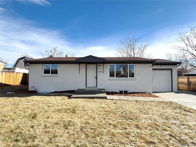 single story home featuring a front lawn and a garage